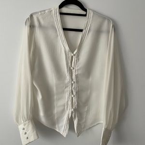 Unique white blouse with transparent sleeve